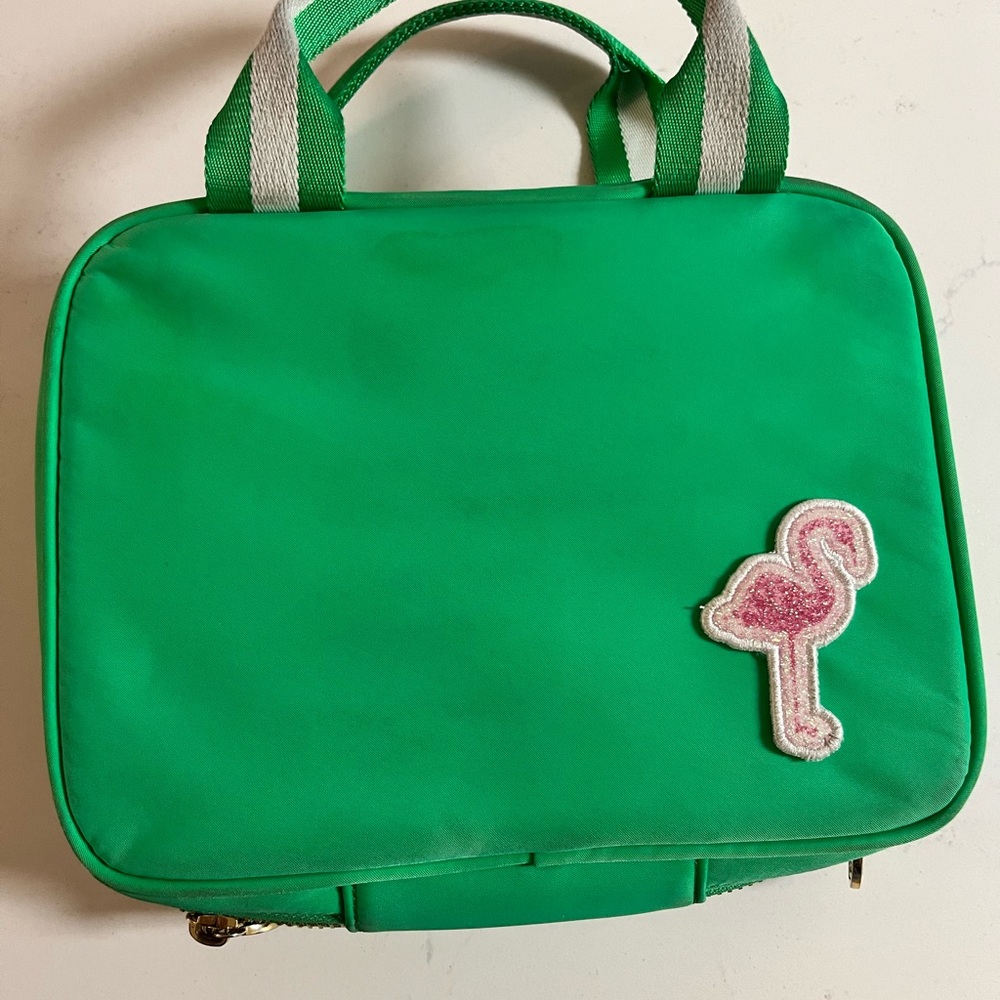 Stoney Clover Lane Green Lunch Bag with Pink Flamingo Patch. Used for 1 schoolyr